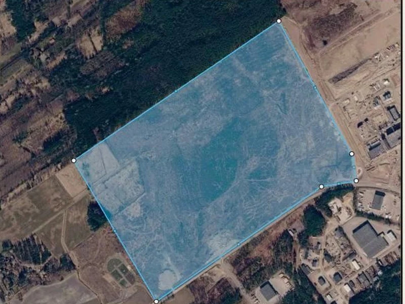 Site boundary and developable area marked on the raw plot of land